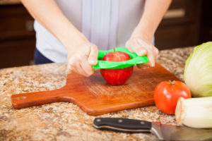 Slicing an apple in the kitchen