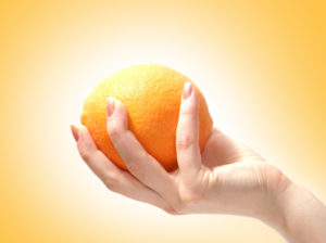 Squeeze Orange in Hand